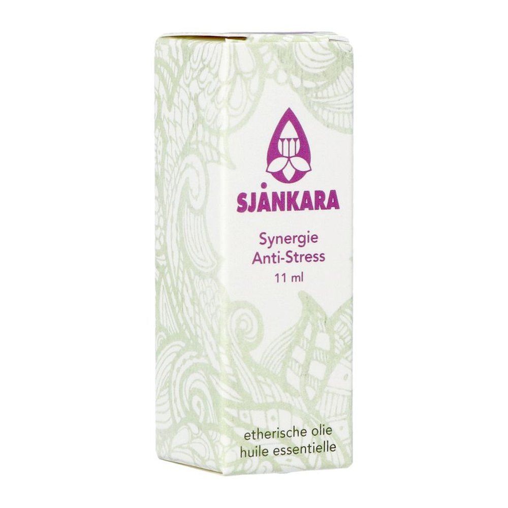 Emballage en carton avec logo, nom du produit et indication de volume. Motif floral sur fond blanc.