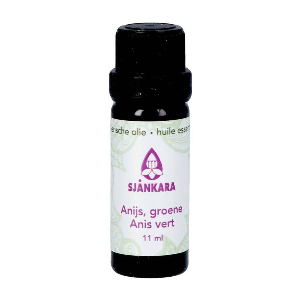Kleine fles essentiële olie. Opschrift: Sjnkara, Anis vert, 11 ml. Paars logo en tekst.