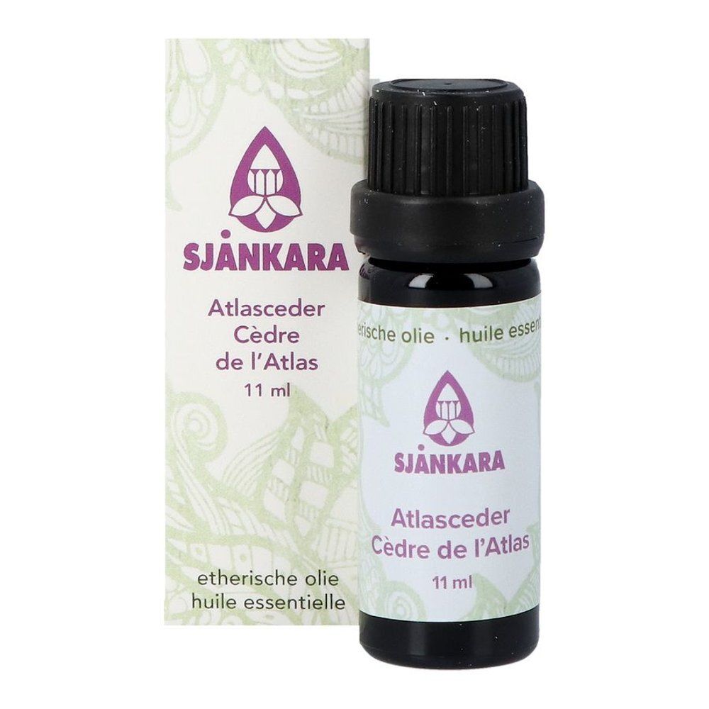 Bruine glazen fles met zwarte dop. Etiket met productnaam, merk Sjankara en 11 ml.