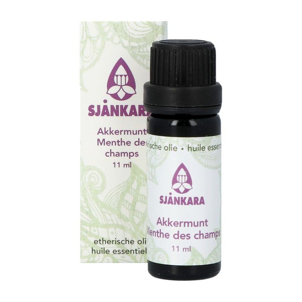 Productfles en verpakking. Bruine fles met zwarte dop. Verpakking met logo en productnaam.