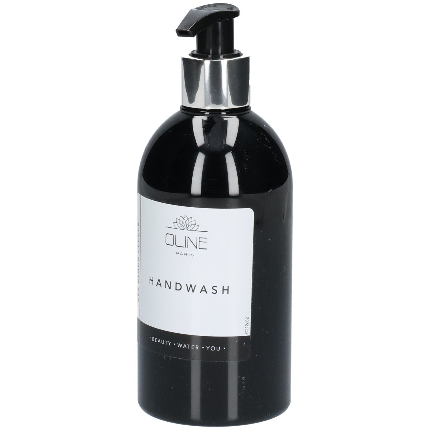Flacon de lavage des mains noir avec pompe argentée. Étiquette blanche avec nom et logo du produit. Texte: Handwash, Oline Paris.