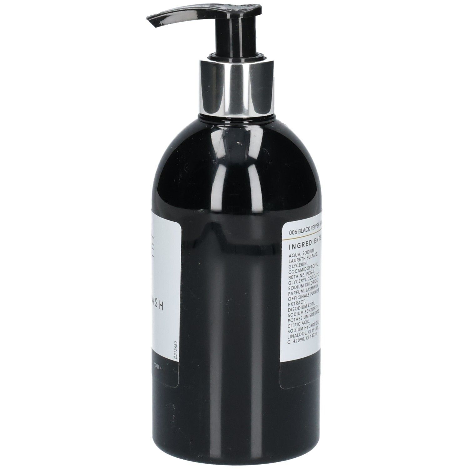 Flacon de lavage des mains noir avec pompe argentée. Étiquette avec ingrédients. Texte: 006 Black Pepper, ingrédients, Oline Paris, 280ml.