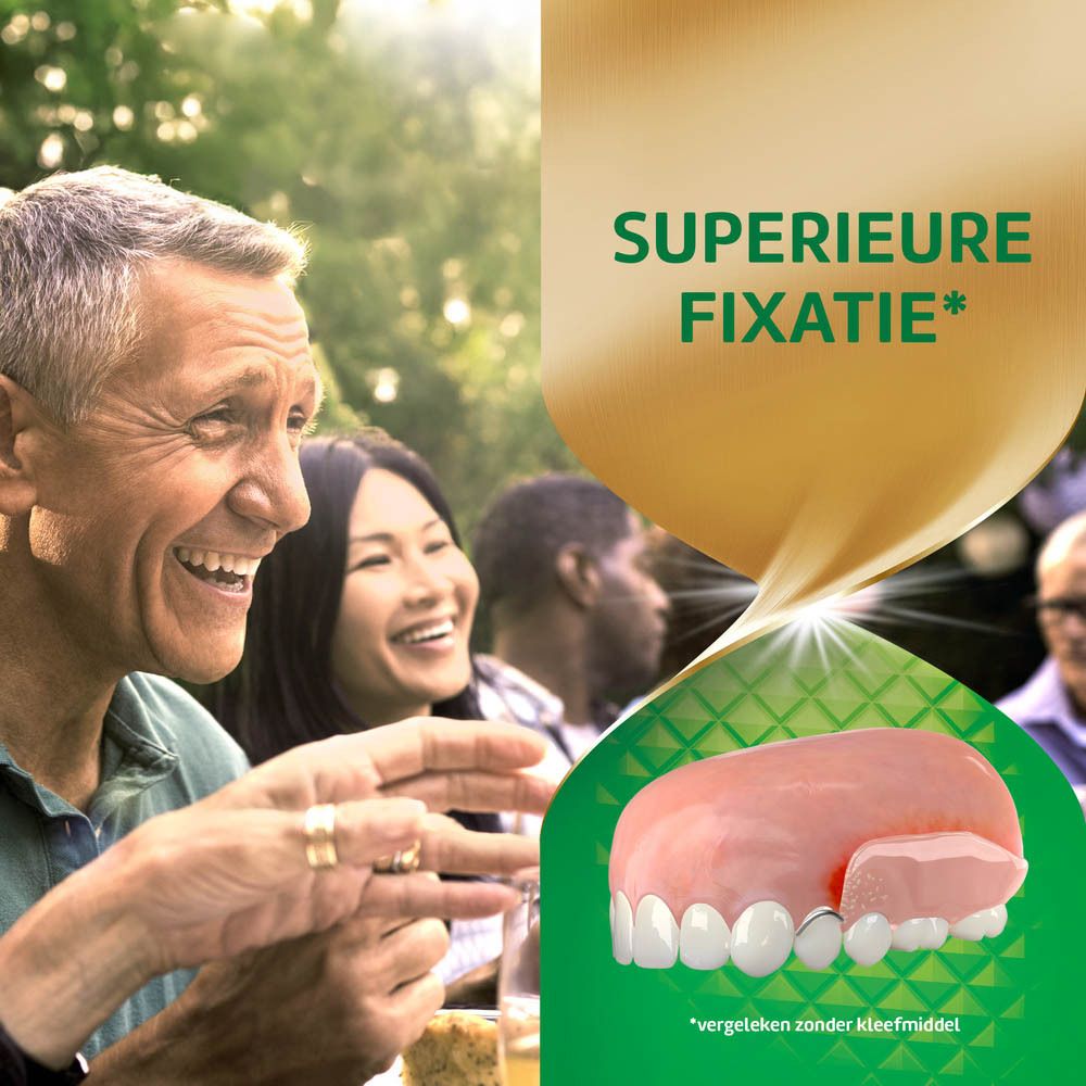 Lachende mensen. Kunstgebit met kleefcrème. Tekst: SUPERIEURE FIXATIE.