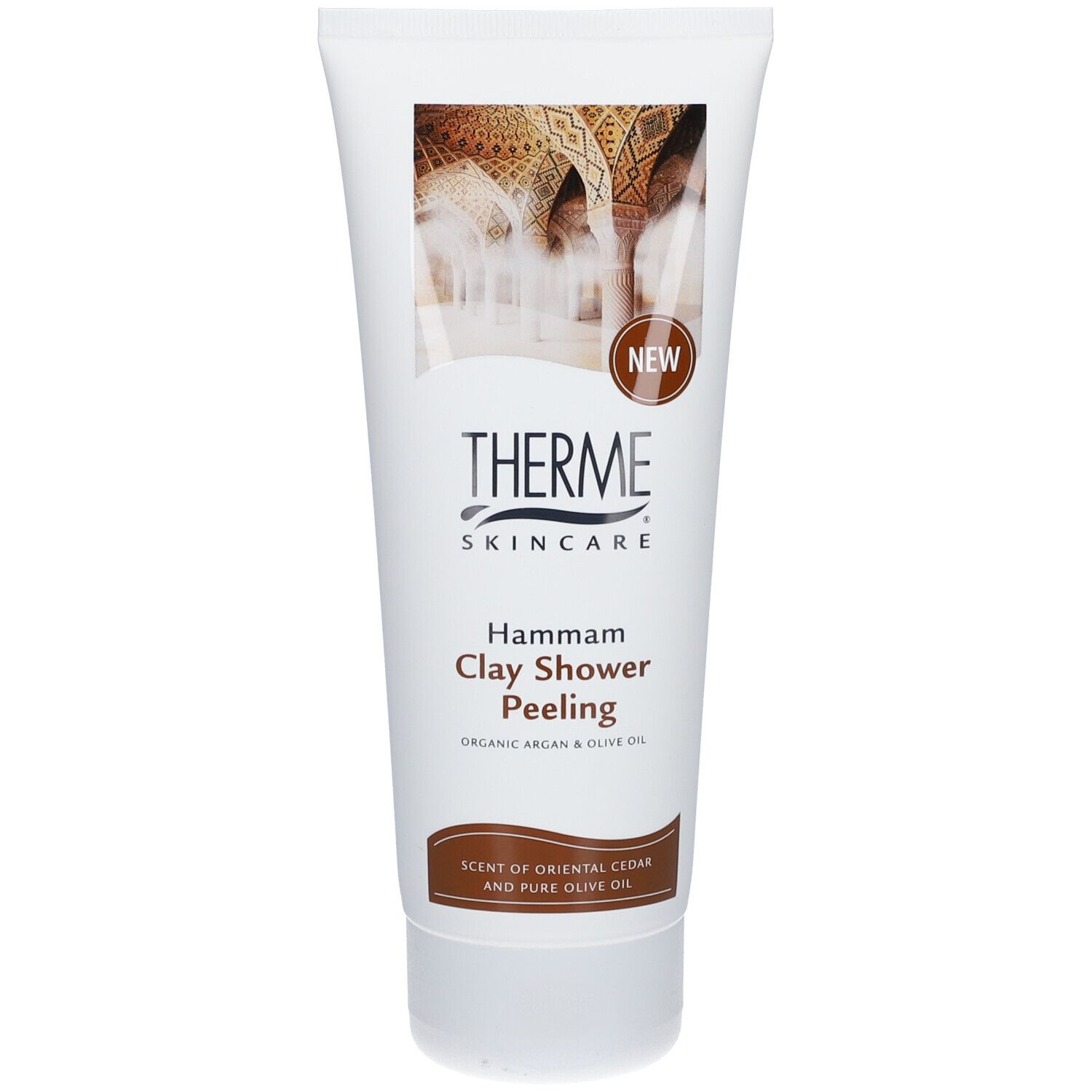 Witte tube THERME Skincare Hammam Duschpeeling. Bruine tekst en afbeelding. "NEW" sticker. Tekst: "Clay Shower Peeling".