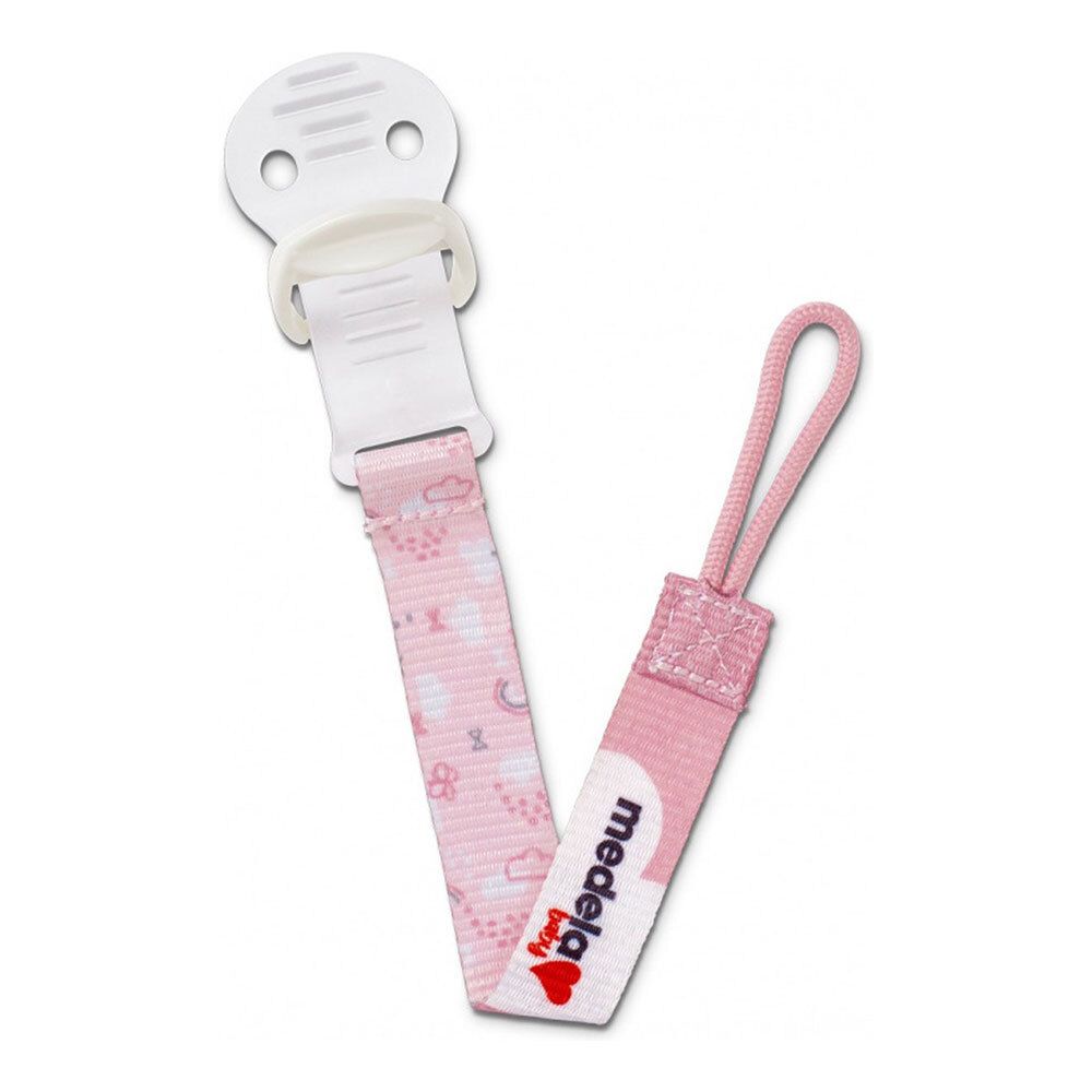 Attache-tétine Medela Baby rose avec motif nuages et arc-en-ciel. Clip blanc pour fixation.