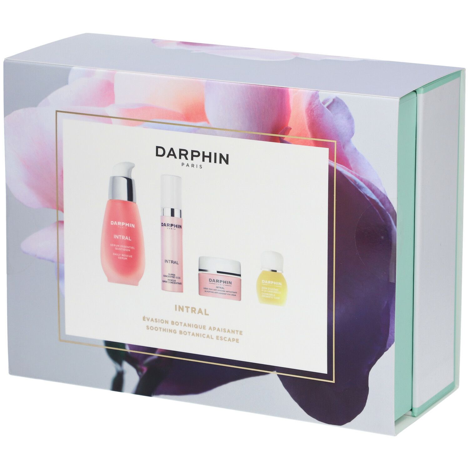 Cadeauset met vier producten. Roze vloeistoffen en crèmes in witte en transparante containers. Opschrift: DARPHIN INTRAL.