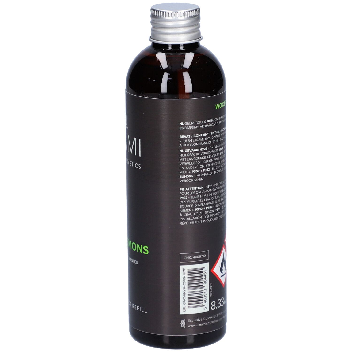Flacon en verre brun avec bouchon argenté. Étiquette noire avec symboles d'avertissement, texte et quantité: 8.33 fl oz.
