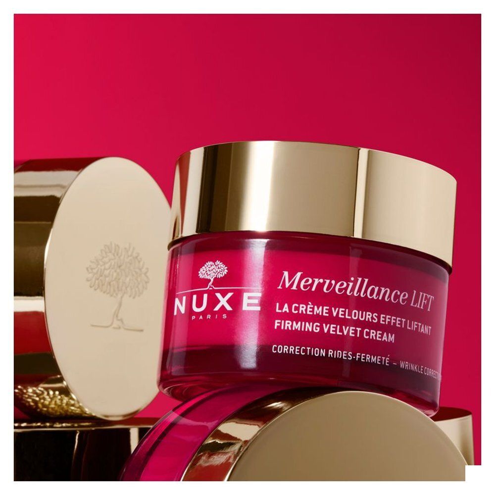 Nuxe Merveillance Lift Firming Velvet Cream pot met zilverkleurig deksel en rode body.