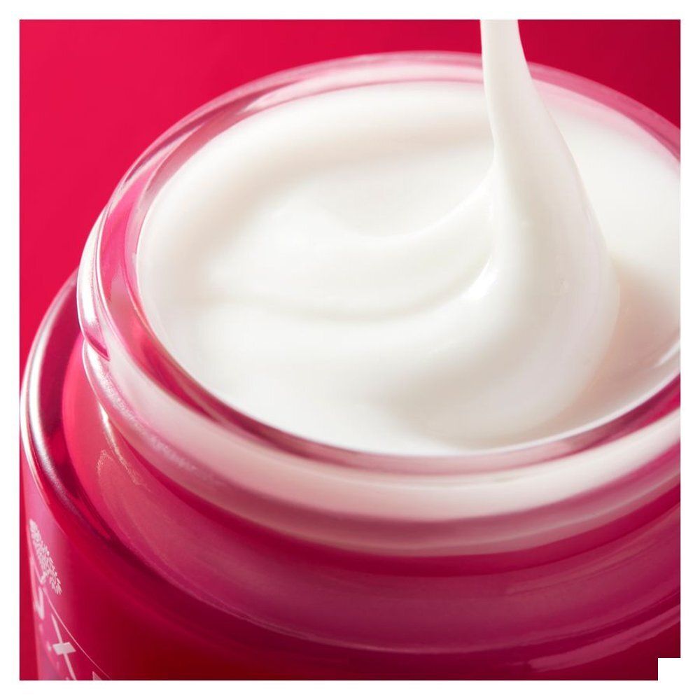 Nuxe Merveillance Lift Firming Velvet Cream pot met zilverkleurig deksel en rode body.