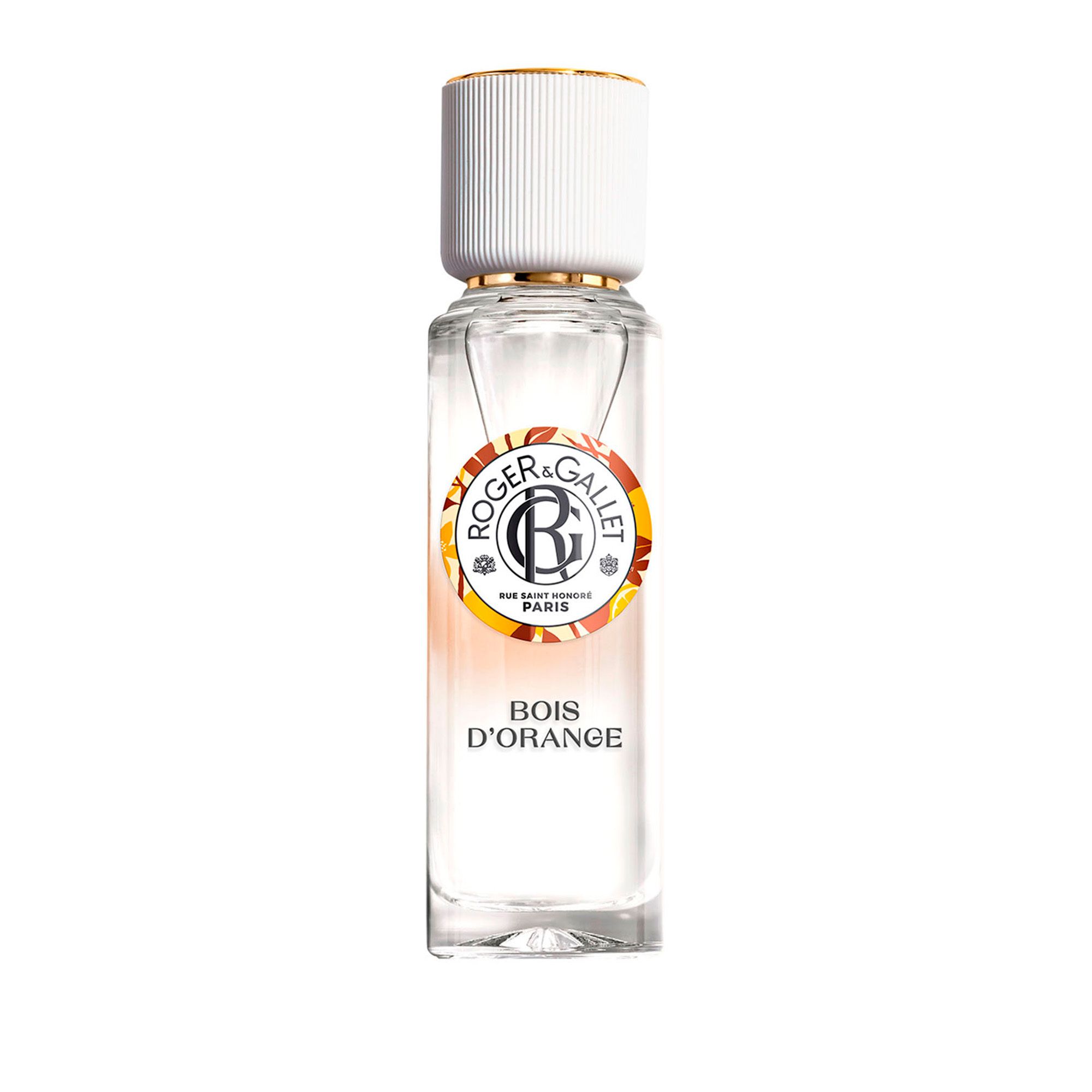 Flacon avec bouchon blanc. Étiquette: Roger & Gallet, Bois d'Orange. Anneau doré. Contenu transparent.