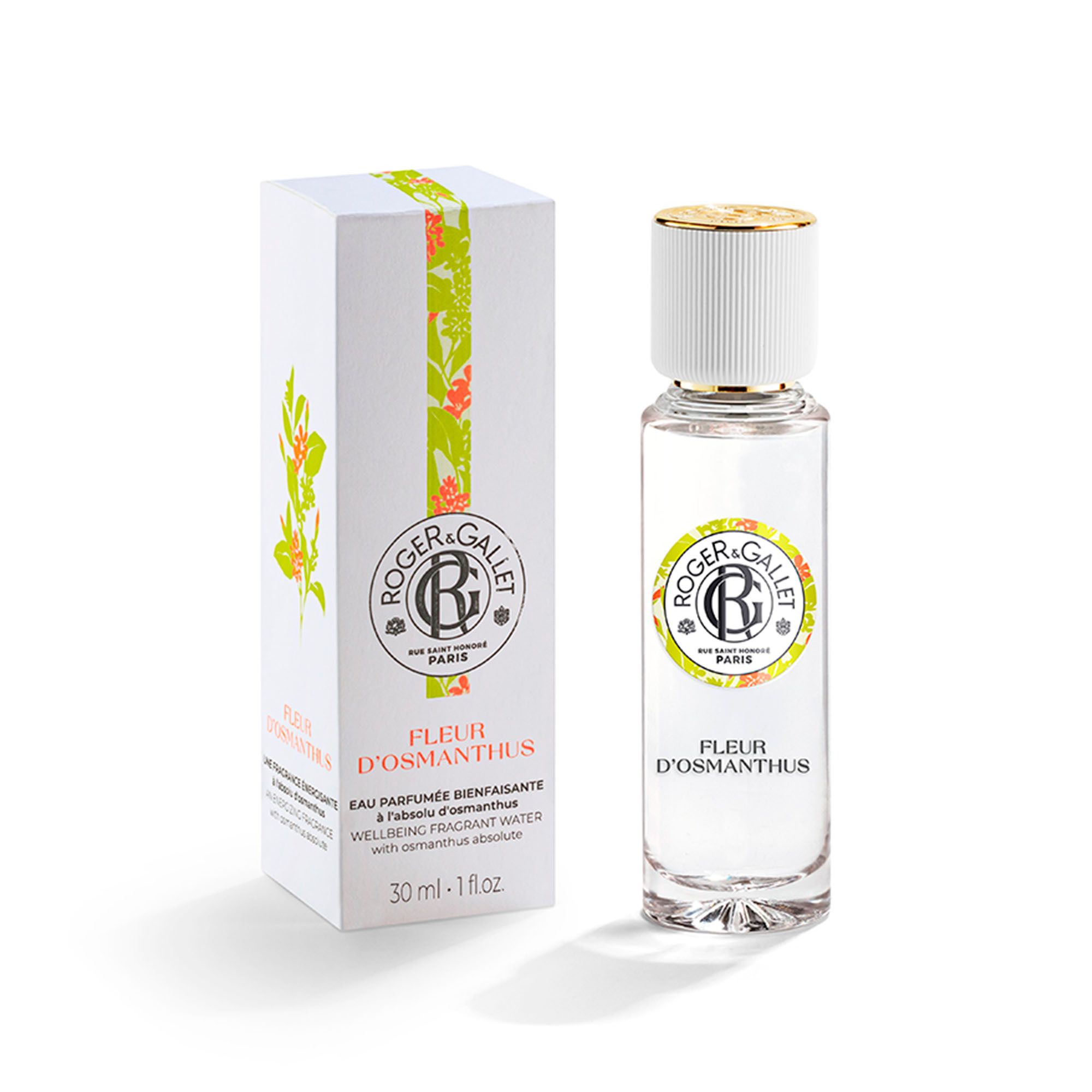 Verpakking en fles. Opschrift: FLEUR D'OSMANTHUS. Fles met witte dop en gouden dop.