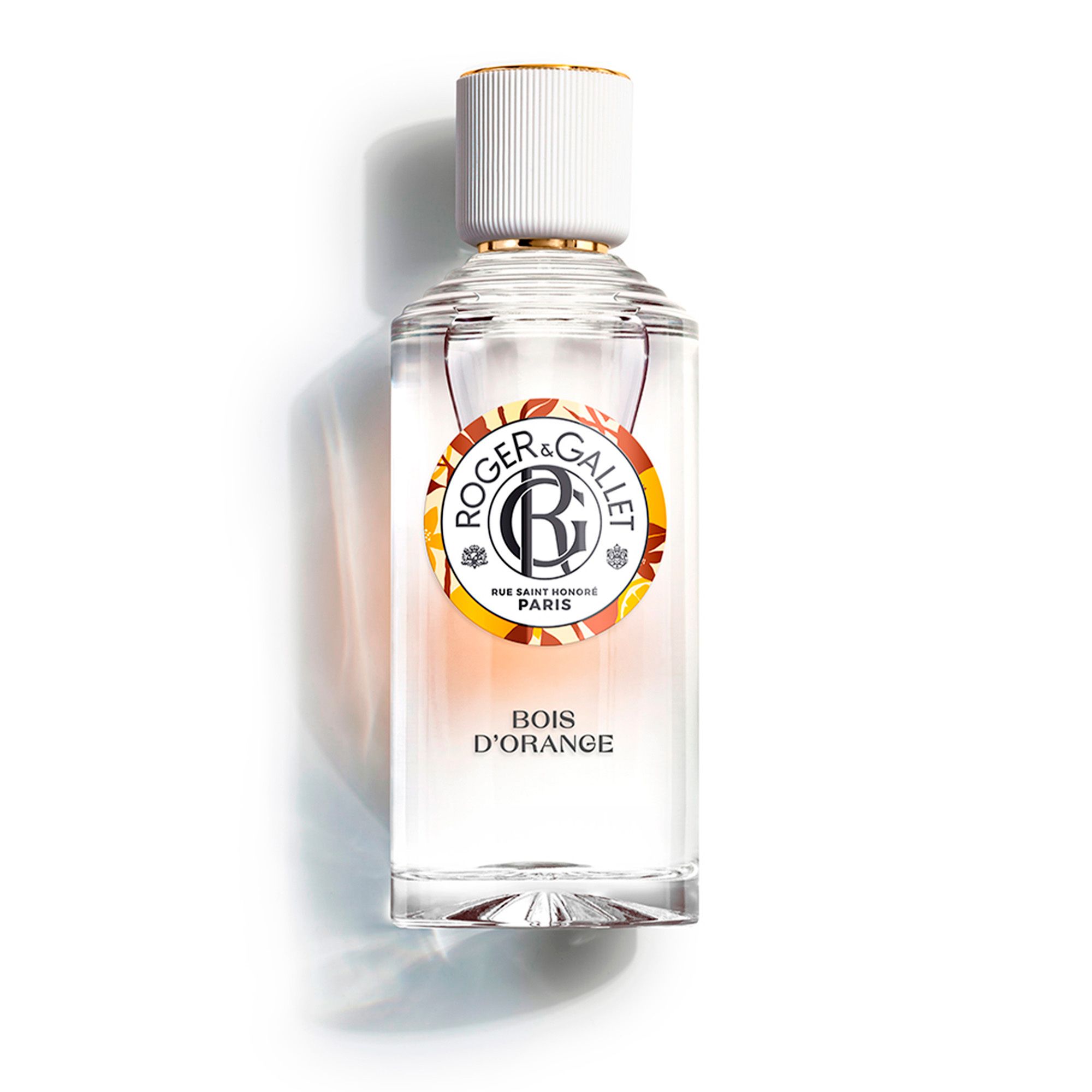 Flacon Roger & Gallet 'Bois d'Orange'. Bouchon blanc, bord doré.