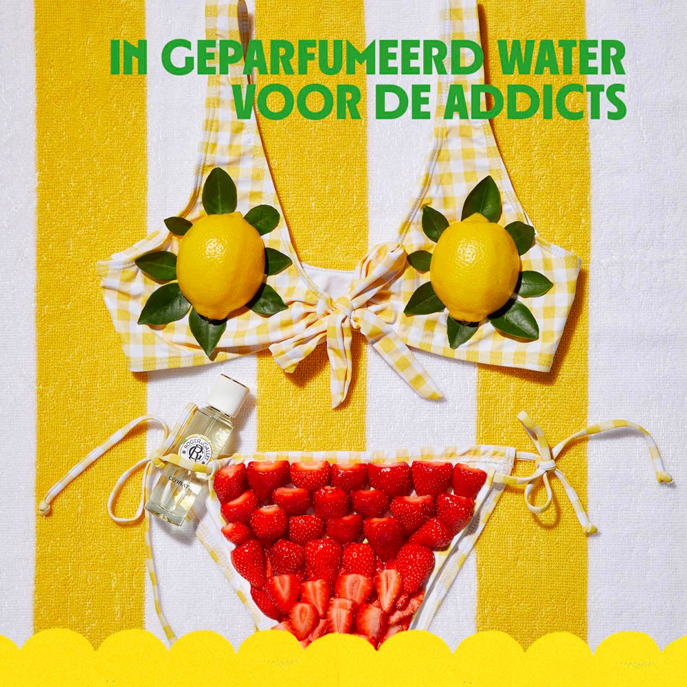 Vrouw met zonnebril en citroen. Tekst: Cederappel, Zesty, Kardemom, Fris, Basilicum, Guaiac Hout.