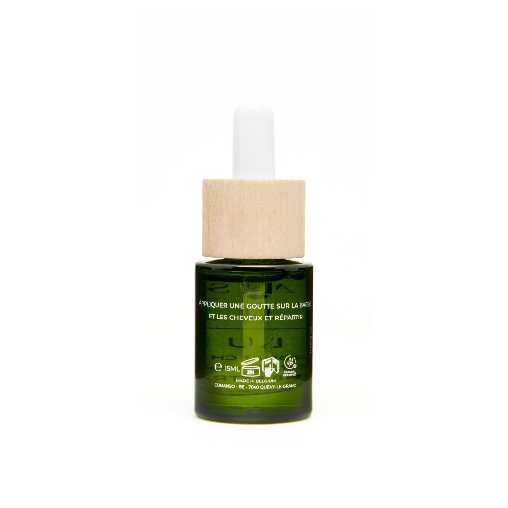 Dos du flacon. Inscription: Appliquer, 15ml, logos. Certifications et informations.