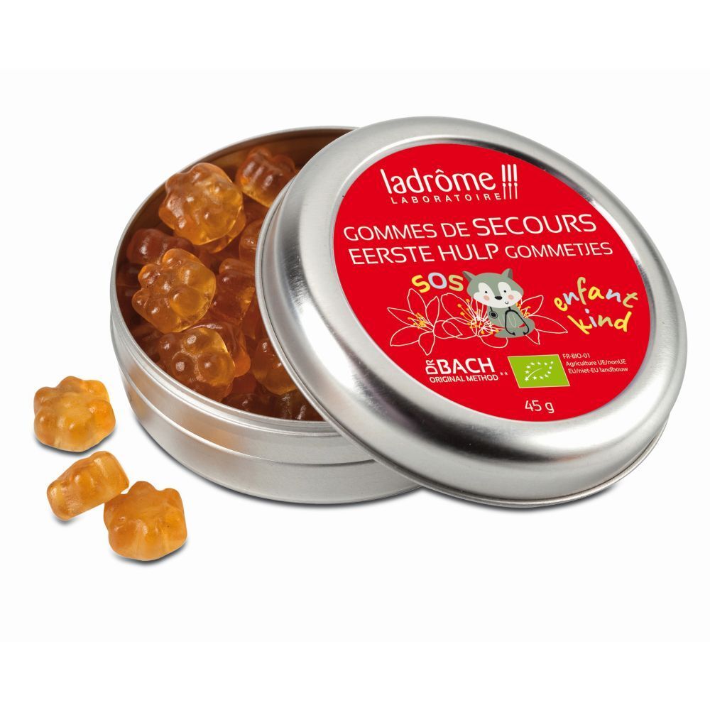 Boîte ouverte avec gommes. Inscription: Ladrôme, Gommes de Secours, SOS, enfant. Label bio, 45 g. Gommes à côté.