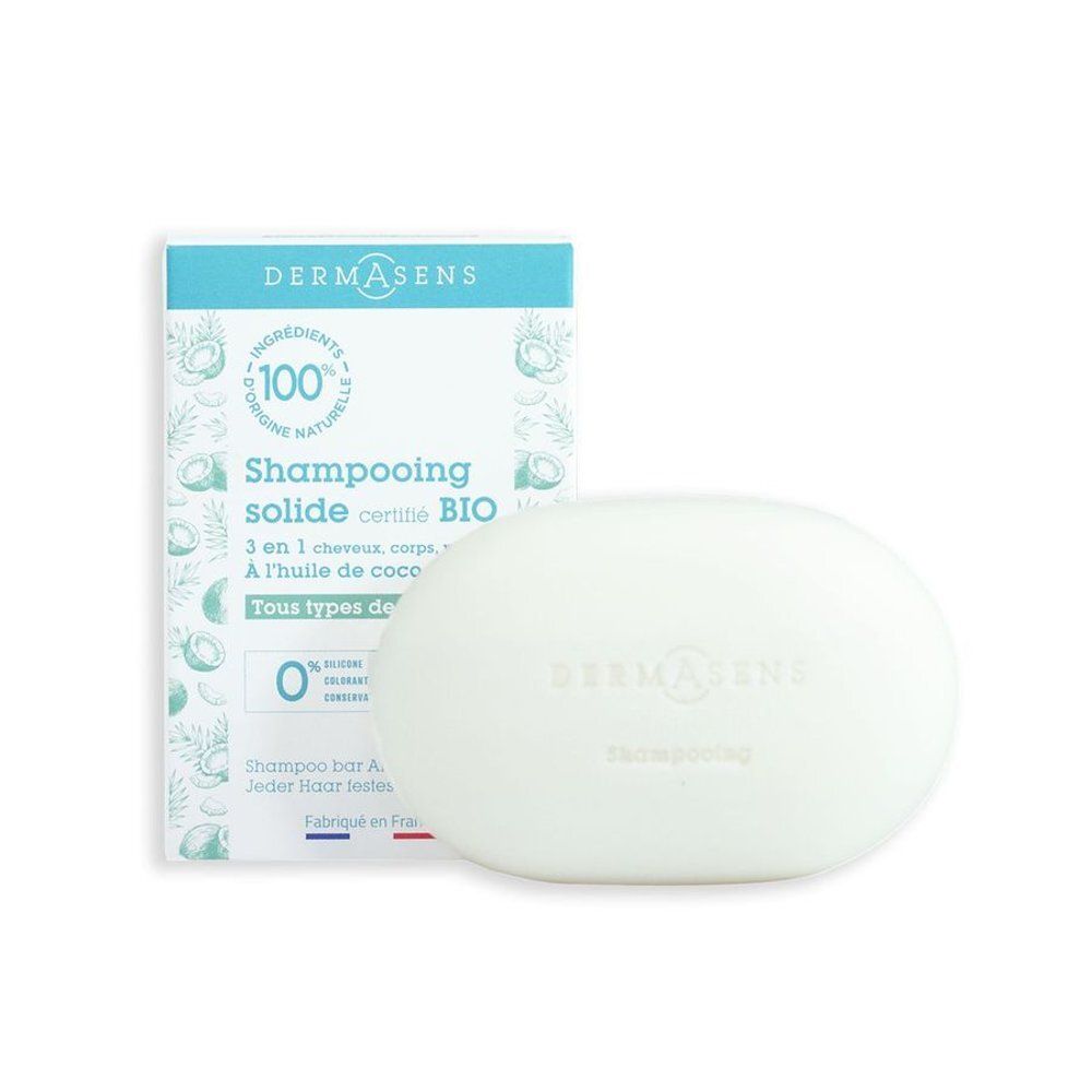 Ovale vaste shampoo, naast verpakking. Merk DermAsens, tekst: Shampooing solide certifié BIO, 100% naturelle, Tous types de cheveux.