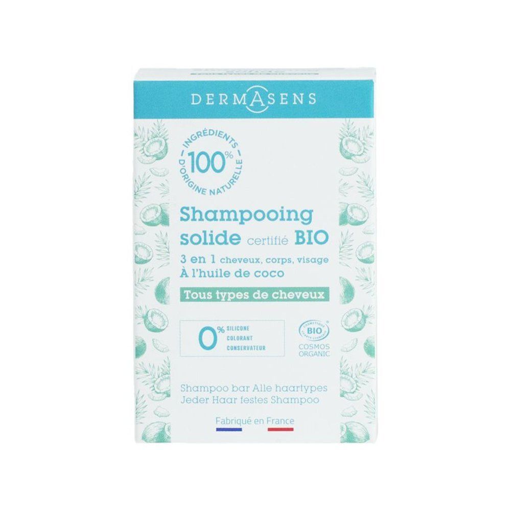 Productverpakking met productinformatie. Merk DermAsens, tekst: Shampooing solide certifié BIO, 100% naturelle, Tous types de cheveux.