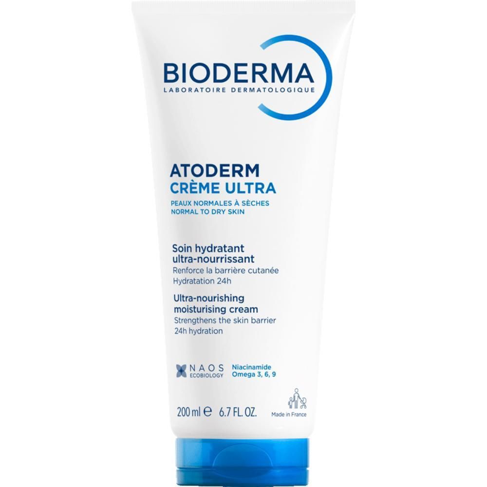 Witte tube met blauwe dop. Opschrift: BIODERMA, Atoderm Crème Ultra. Tekst in het Frans en Engels. 200 ml.