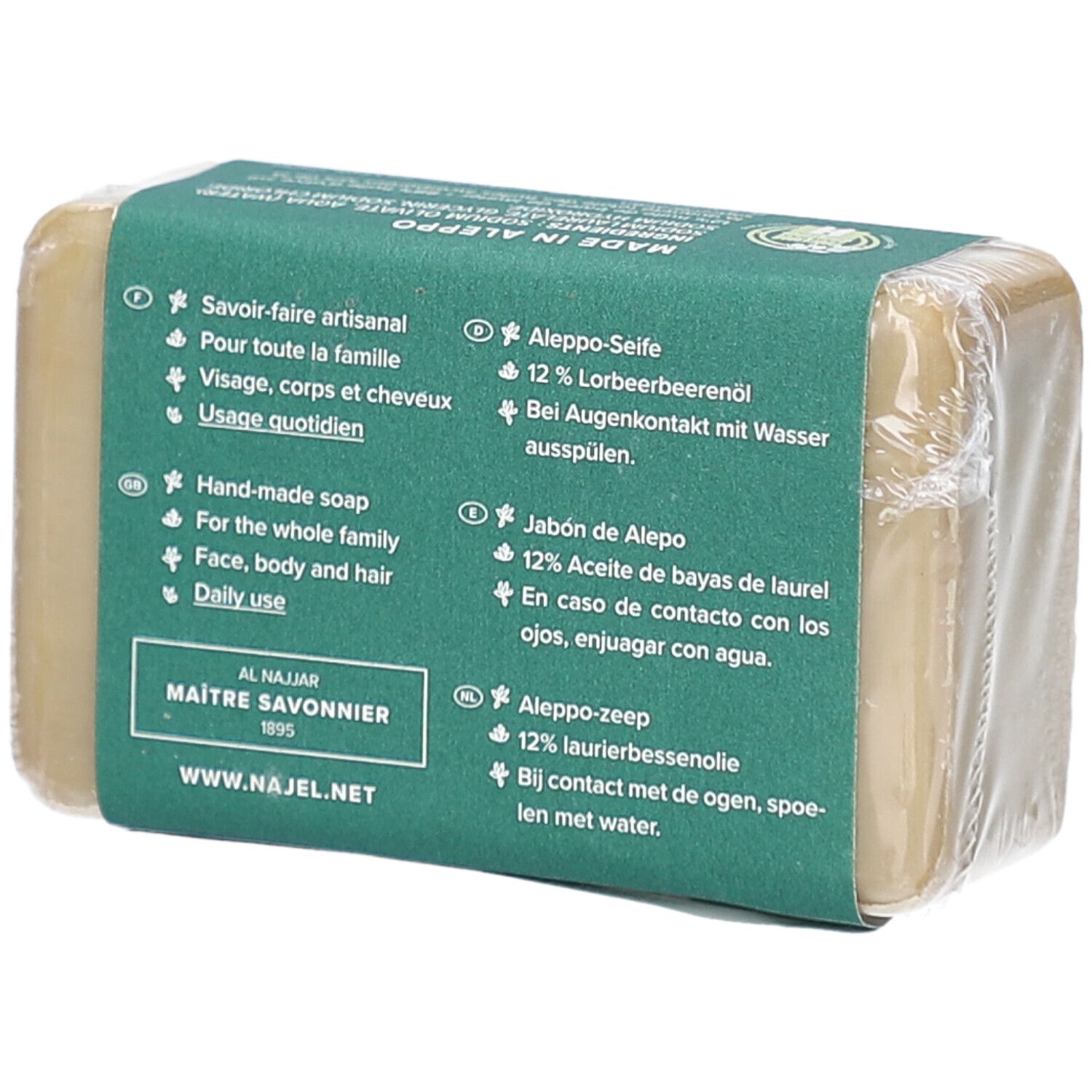 Achterkant van zeep in groene verpakking. Tekst: Savoir-faire artisanal, visage, corps et cheveux, usage quotidien. Al Najjar, Maitre Savonnier.