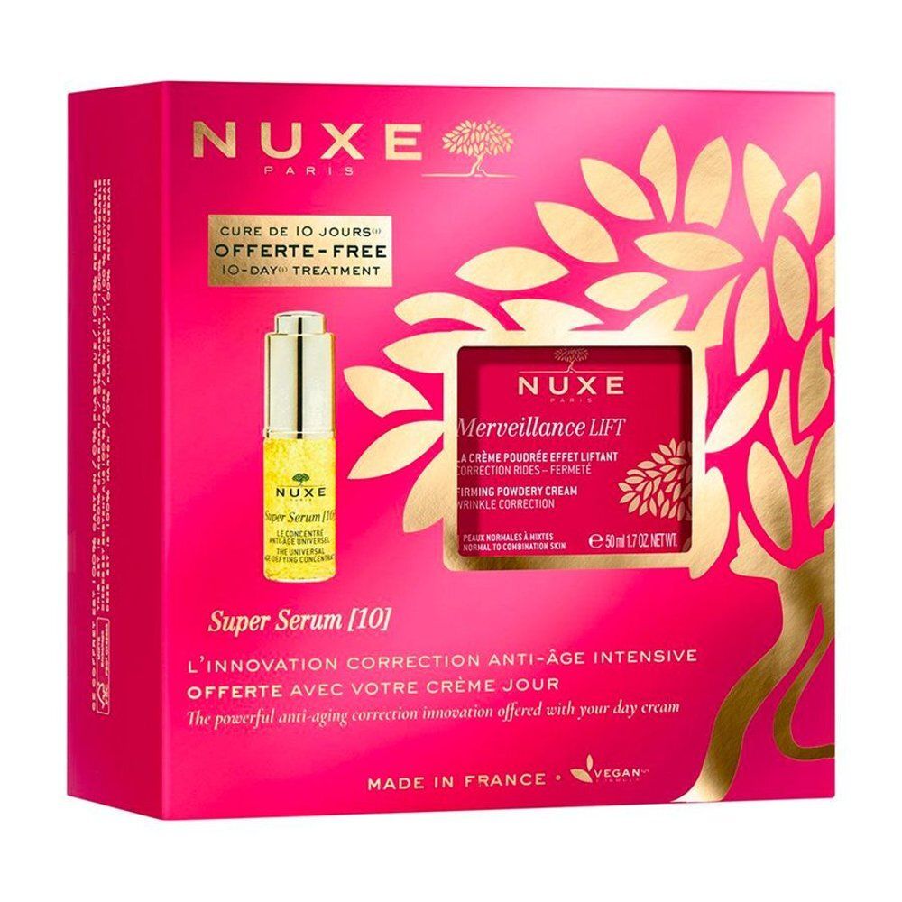 Geschenkverpakking met twee cosmetische producten. Rode doos met gouden details. Bevat serumfles en pot.