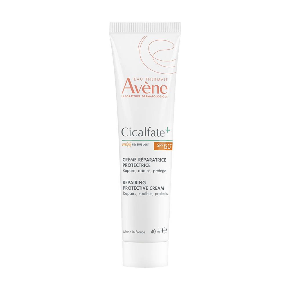 Avene Cicalfate+ herstellende beschermende crème met SPF 50+ aangebracht door een vrouw op haar arm.