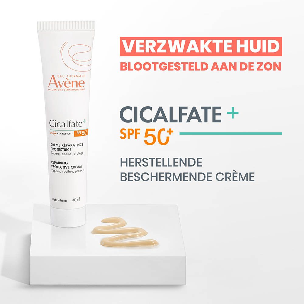 Avene Cicalfate+ herstellende beschermende crème met SPF 50+ aangebracht door een vrouw op haar arm.