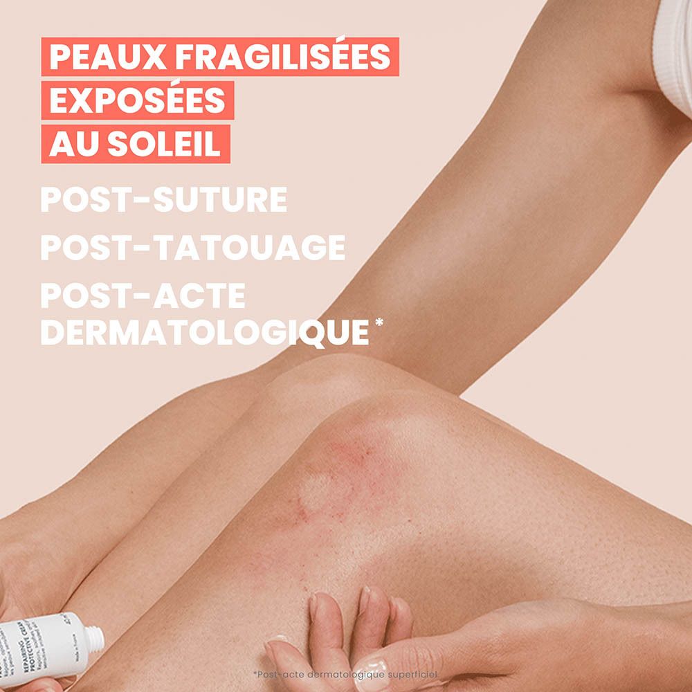 Crème réparatrice protectrice Avene Cicalfate+ SPF 50+ appliquée par une femme sur son bras.