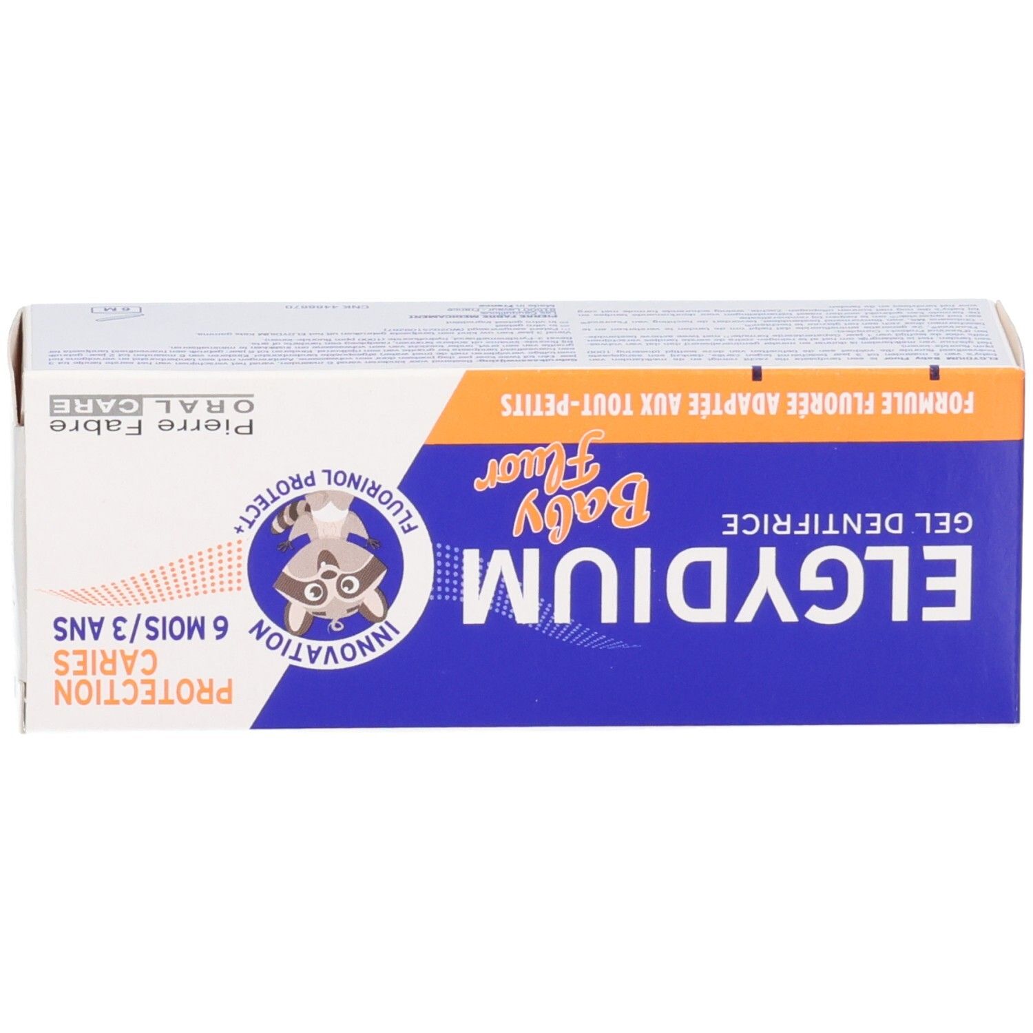 Boîte d'emballage Elgydium Baby Fluor gel dentifrice avec logo raton laveur et indications de protection contre les caries.