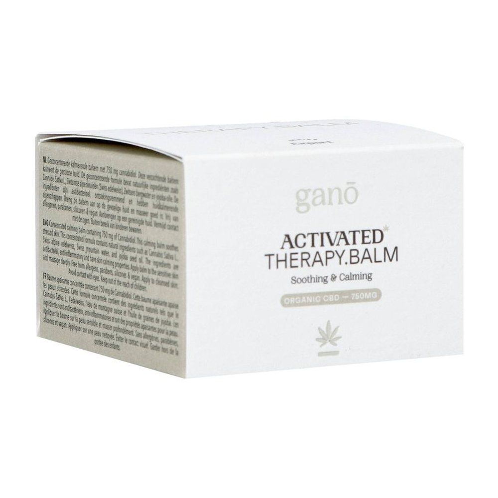 Boîte blanche avec inscription: Ganō, Activated Therapy Balm, Soothing & Calming, Organic CBD. Avec logo cannabis.