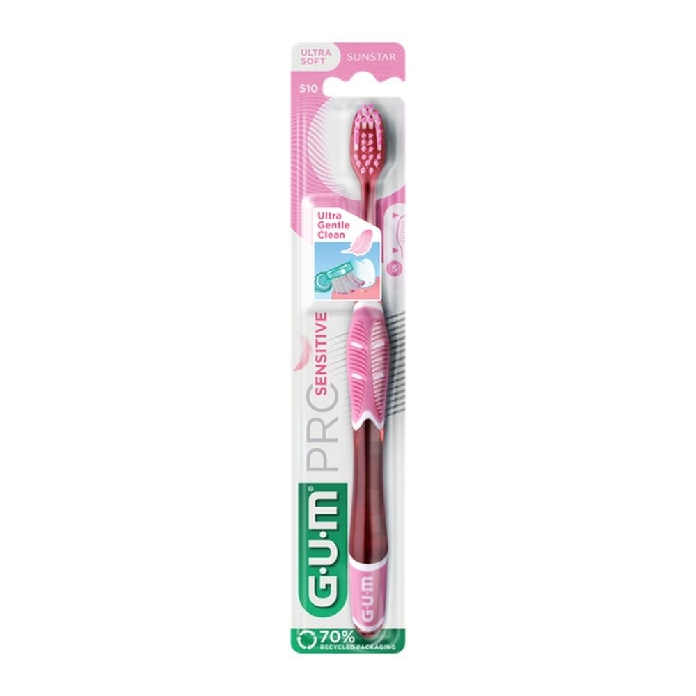 Brosse à dents GUM® PRO SENSITIVE, rose-rouge, emballage transparent. Informations produit et logo de la marque.
