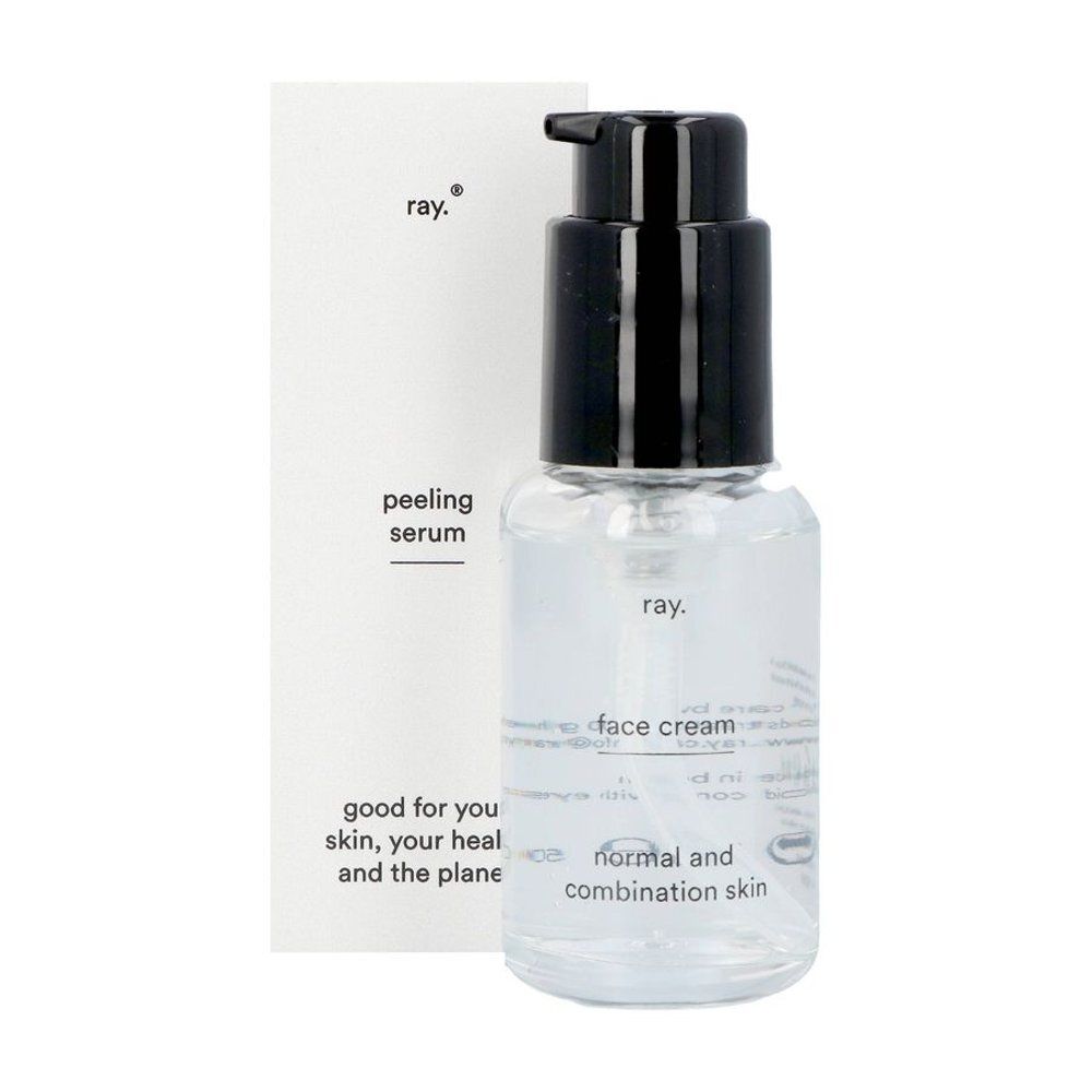 Transparante fles met zwarte pomp en witte verpakking. Op de verpakking staat "ray." en "peeling serum".
