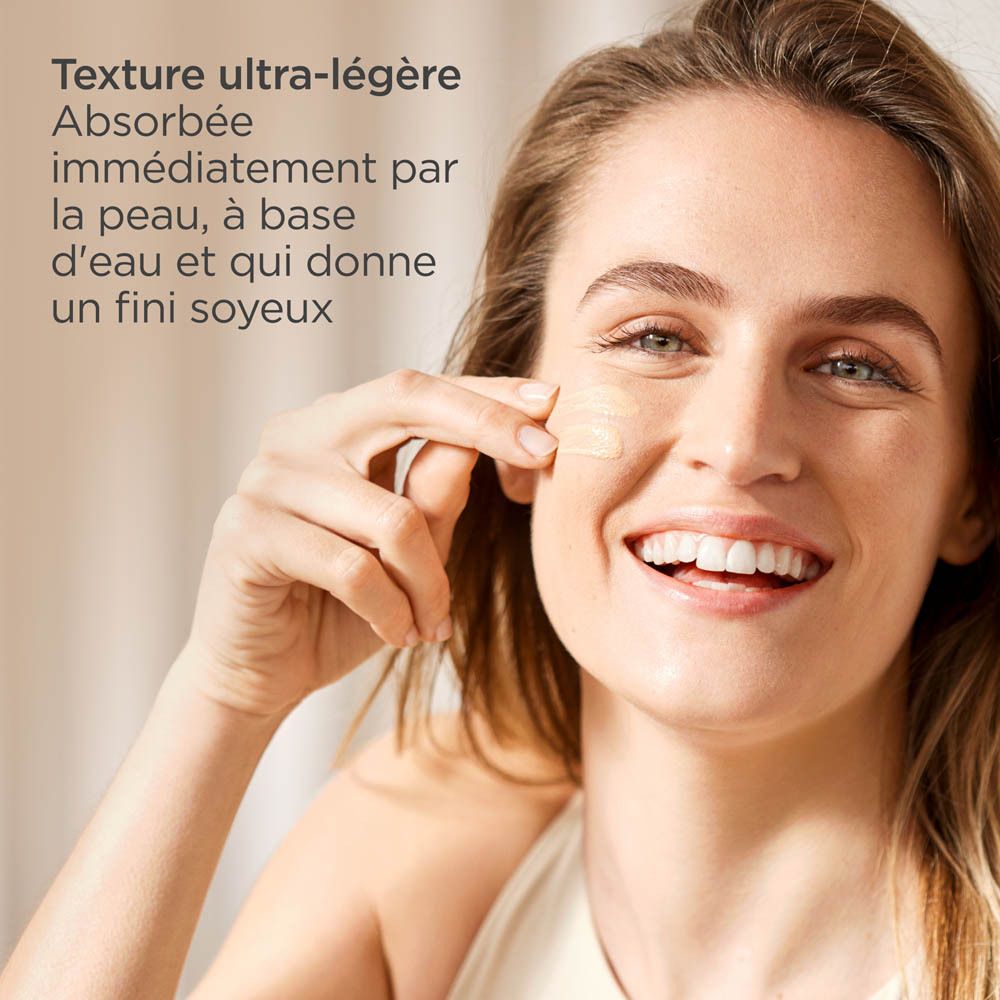 ISDIN Fotoprotector FusionWater Color Light, flacon beige avec bouchon blanc. Vue latérale.