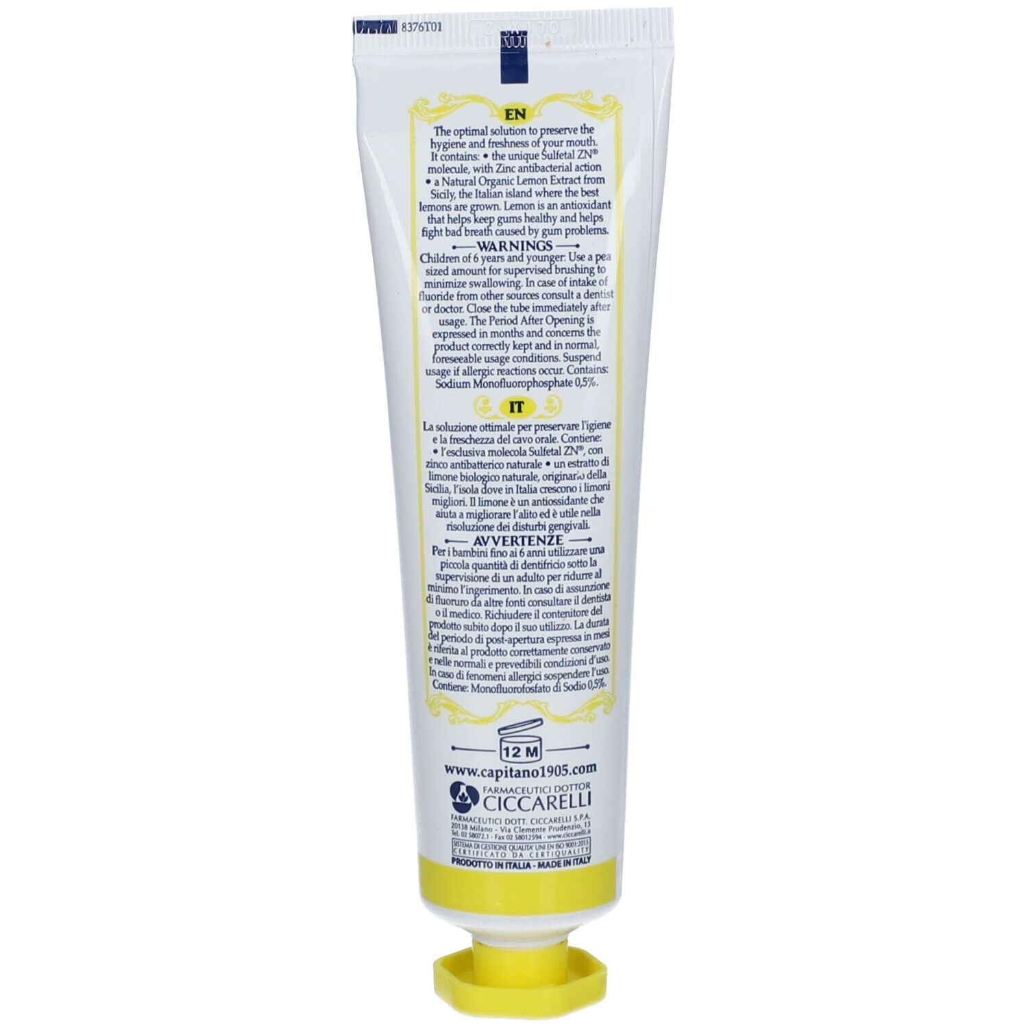 Achterkant van de tandpastatube. Meertalige tekst. Gele dop. Gemaakt in Italië.
