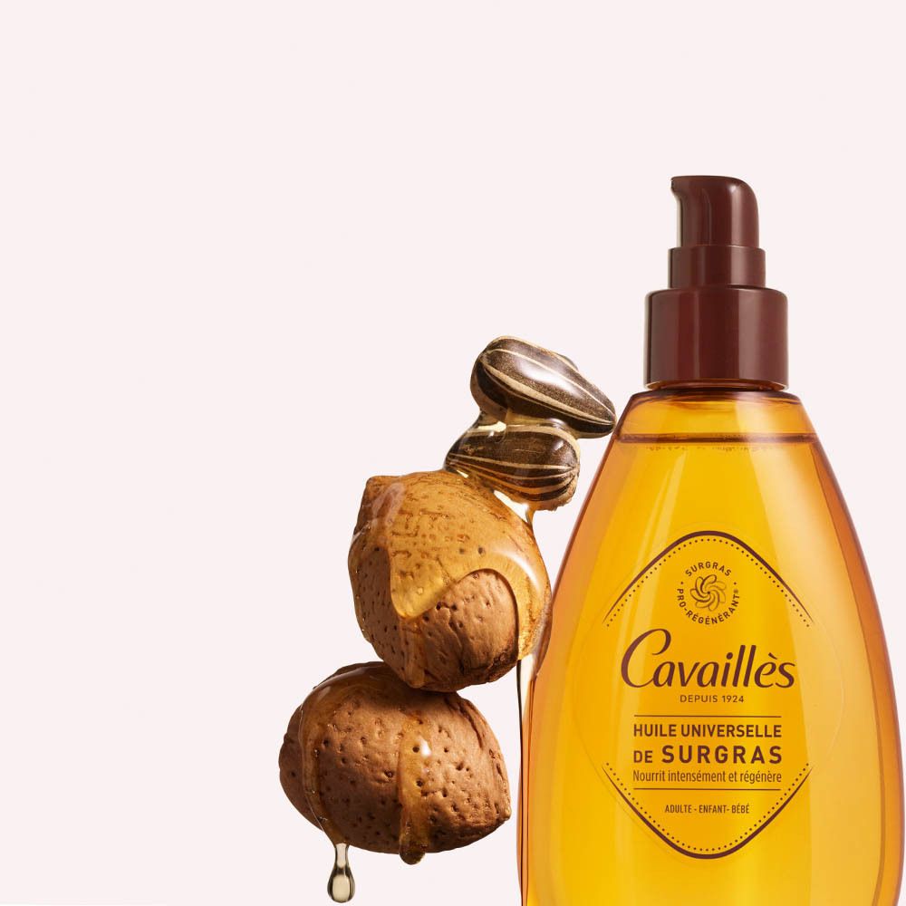 Gele fles met bruine pomp. Opschrift: Cavaillès, Huile Universelle de Surgras. Met noten.