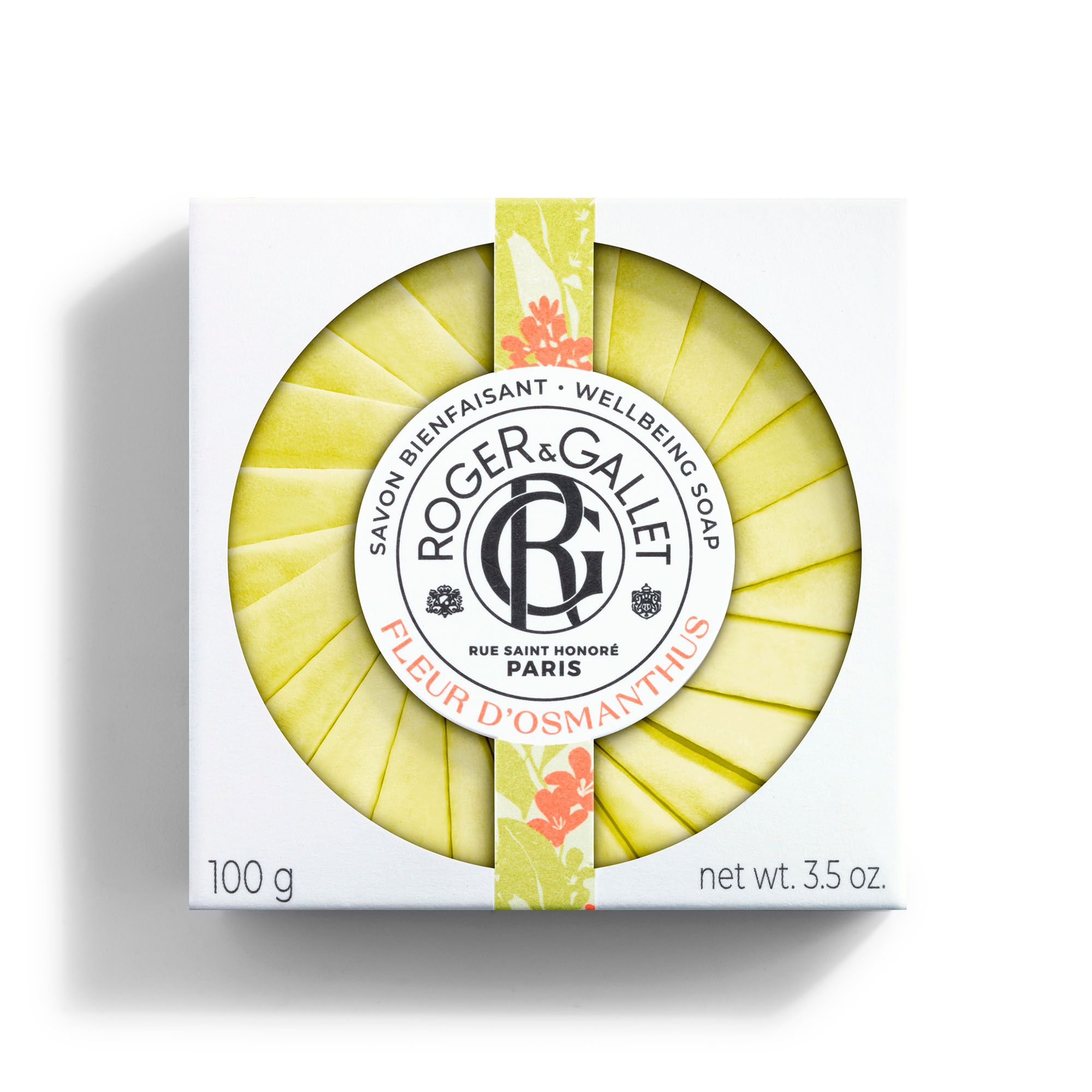 Boîte blanche avec savon vert. Inscription: Fleur d'Osmanthus, Roger & Gallet. Avec extrait d'abricot.