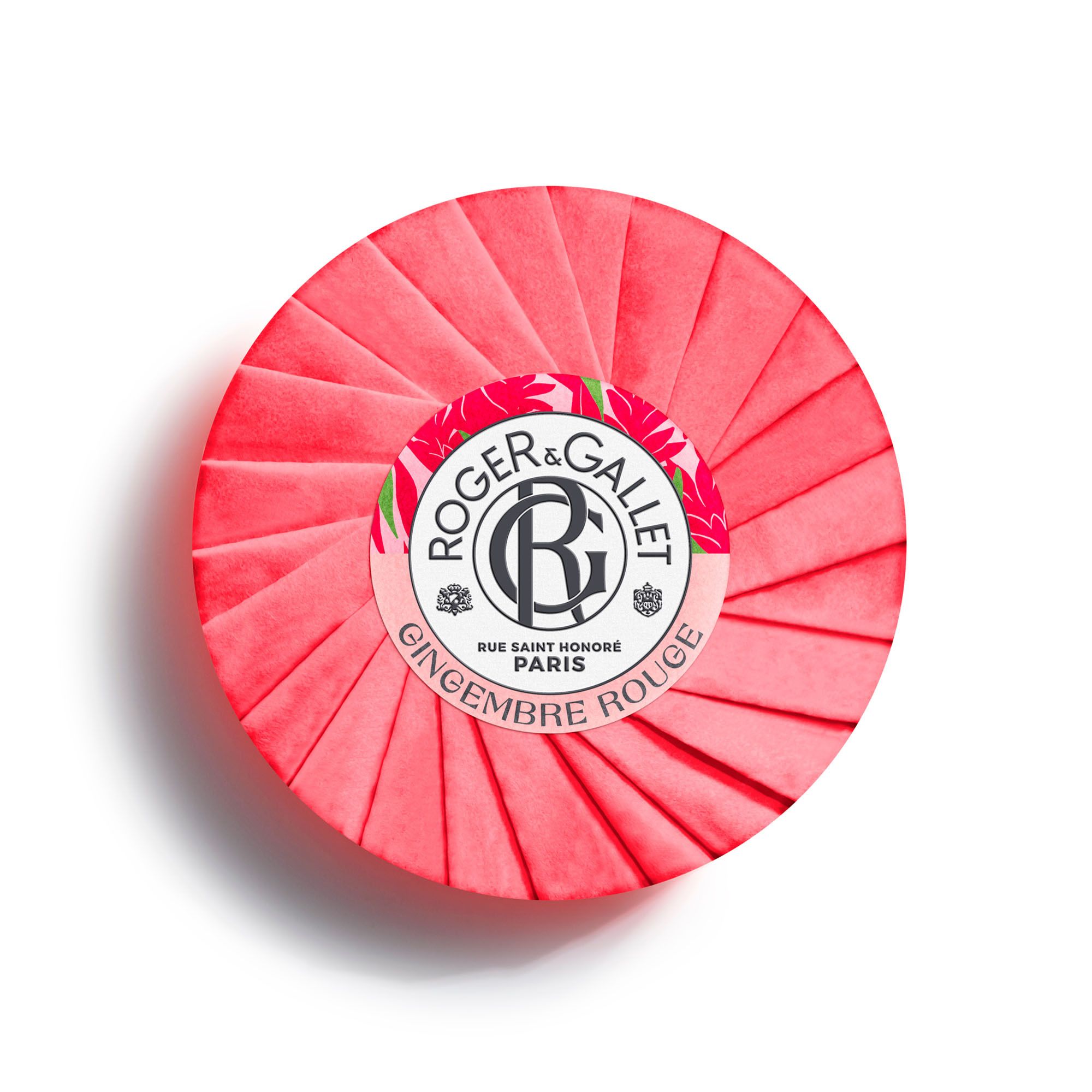 Ronde rode zeep. Merk Roger & Gallet, slogan « Gingembre Rouge ». Verpakking met bloemenlint.