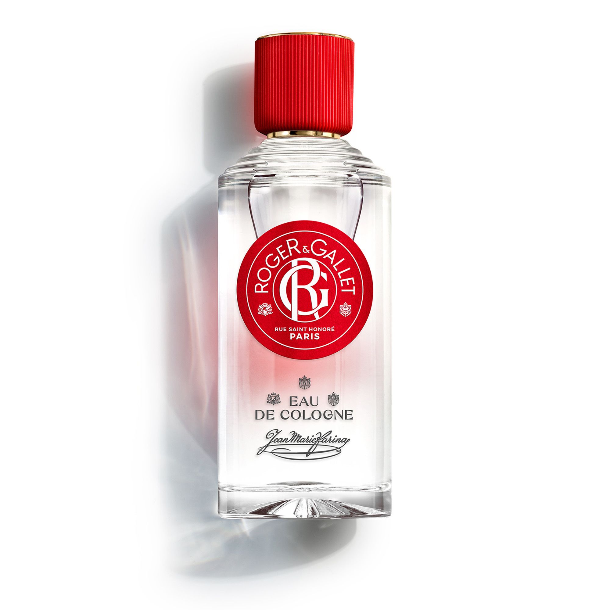 Transparante fles met rode dop. Opschrift: ROGER & GALLET, Eau de Cologne, JEAN MARIE FARINA.