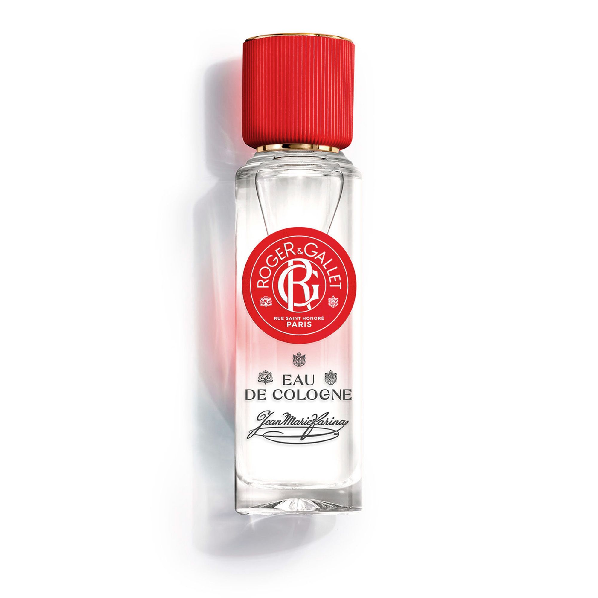 Flacon en verre avec bouchon rouge. Inscription : ROGER & GALLET, Eau de Cologne, Jean Marie Farina. Flacon debout.