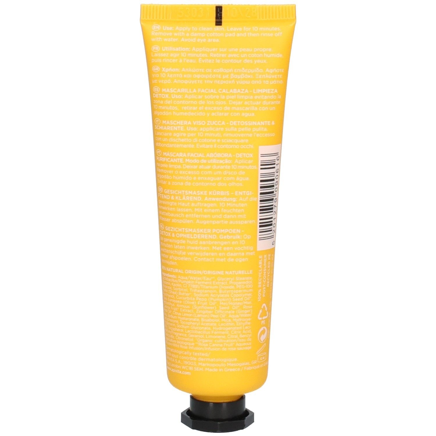 Achterkant van de gele tube. Tekst in meerdere talen. Zwarte dop. Barcode.