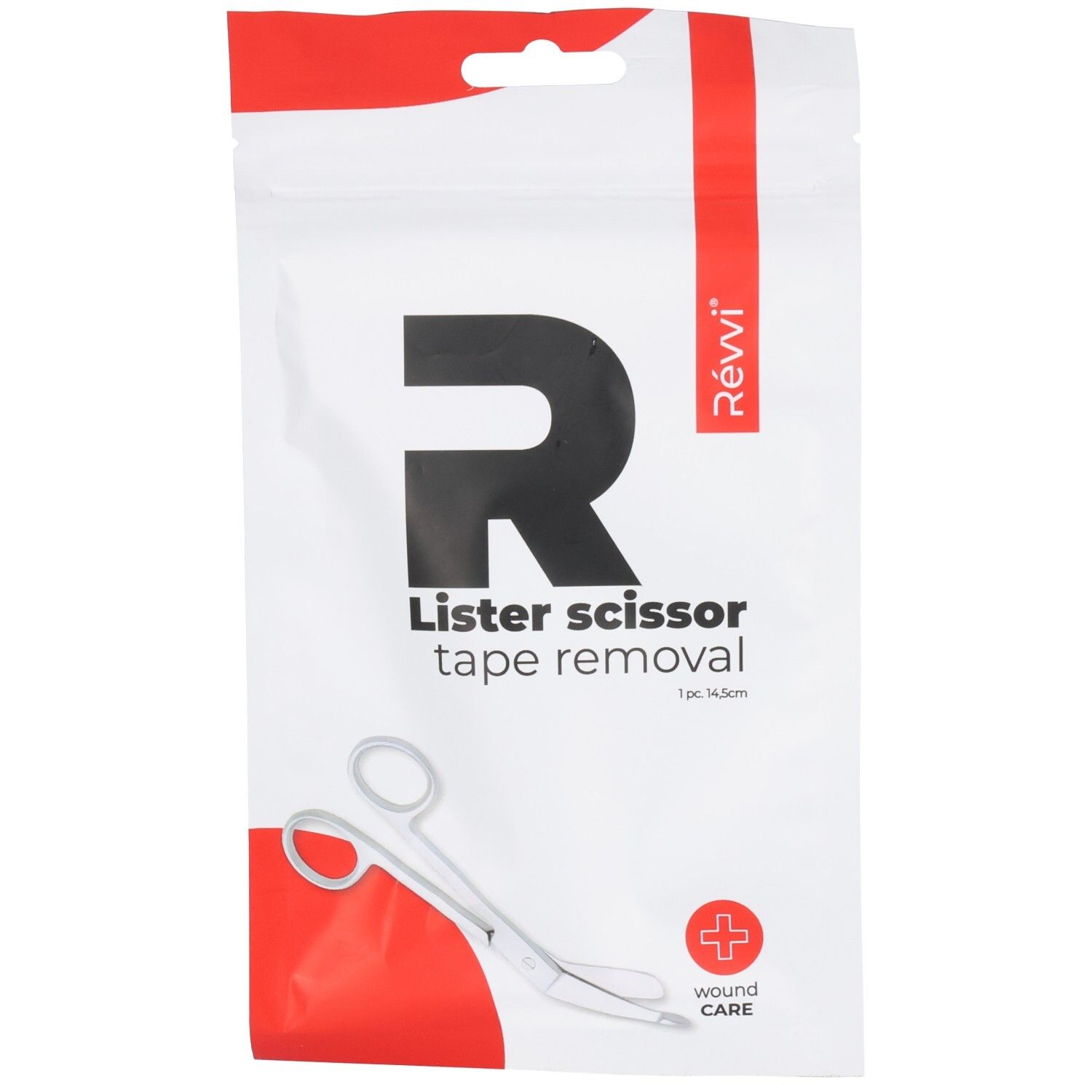 Verpakking met schaar. Opschrift: RÉVVI, Lister scissor, tape removal. Rood kruis symbool. Schaar van roestvrij staal.