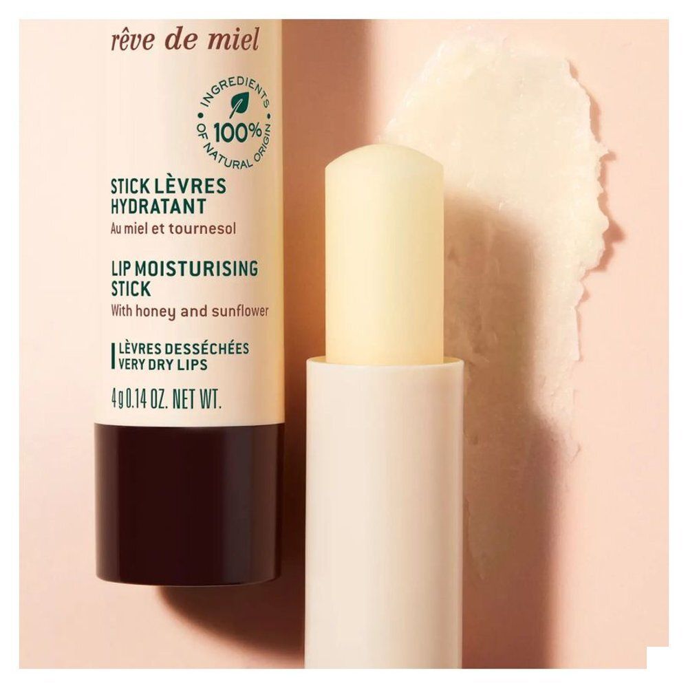 Nuxe Rêve de Miel stick lèvres hydratant, 4g, ouvert. Au miel et tournesol. Ingrédients 100% naturels.
