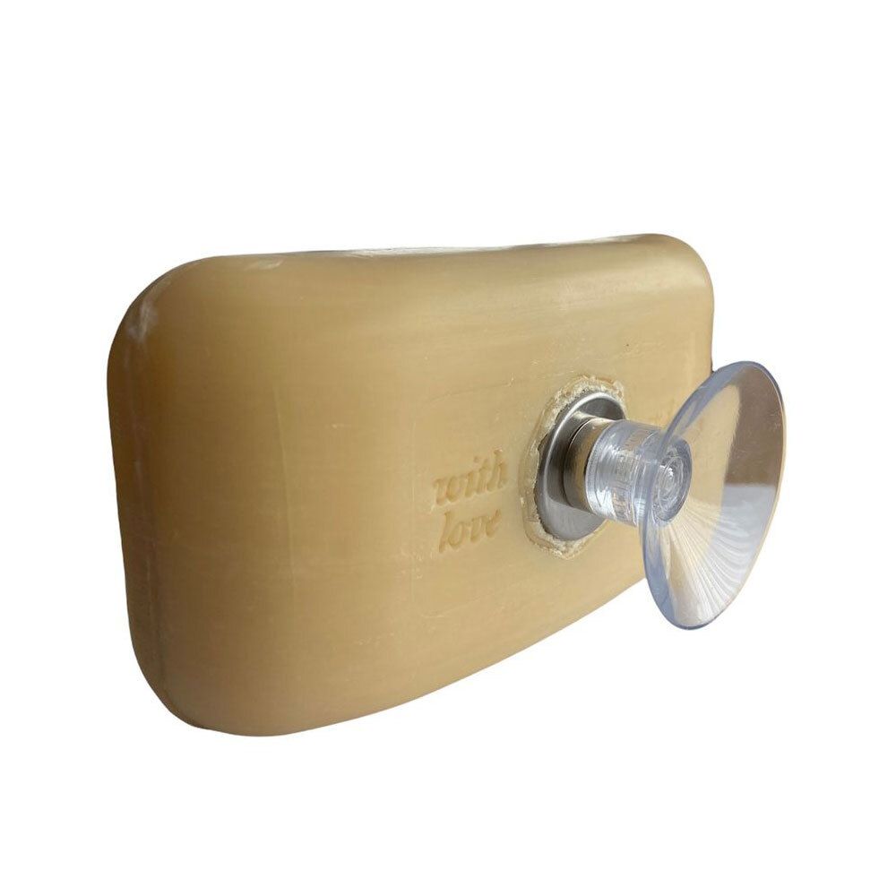 Savon beige avec support métallique et ventouse. Inscription: with love.