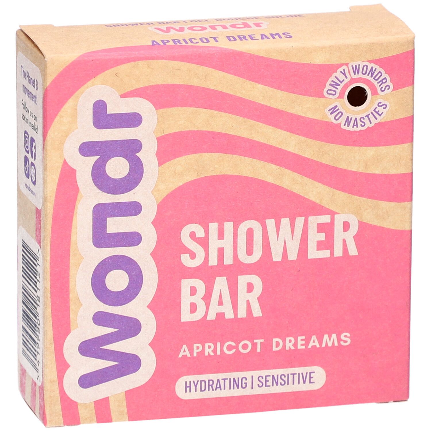 Barre de douche Wondr Apricot Dreams. Emballage rose à motifs ondulés. Inscription : Shower Bar, Hydratant, Sensible.