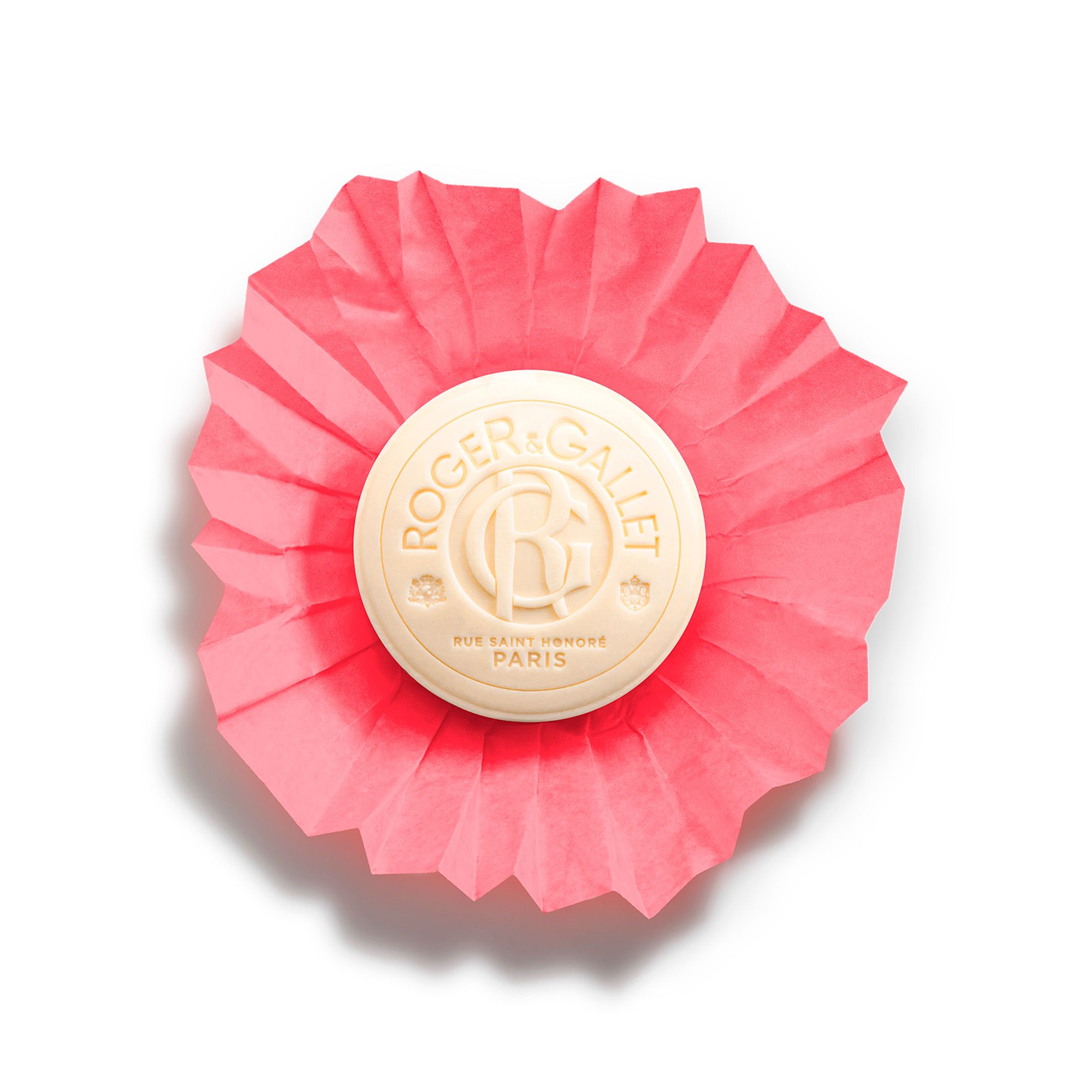 Savon rond avec logo Roger & Gallet. Inscription: Gingembre Rouge. Dans du papier rouge.