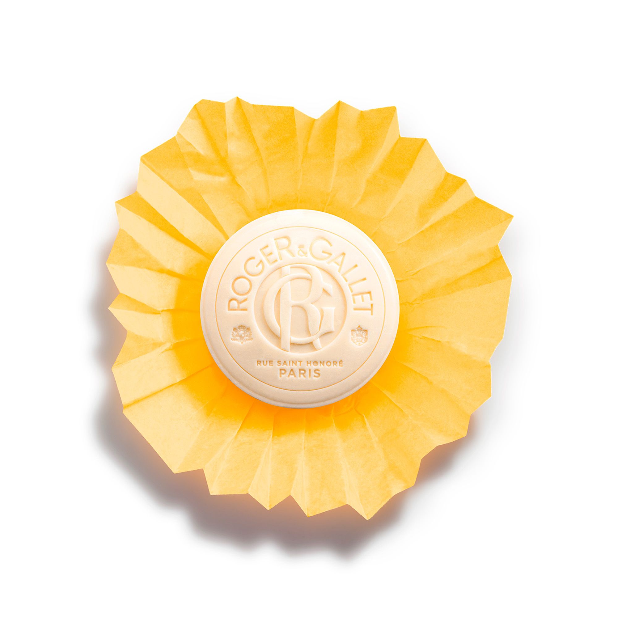 Zeep in geel papier. Logo Roger & Gallet, Bois d'Orange. Papier volledig open.