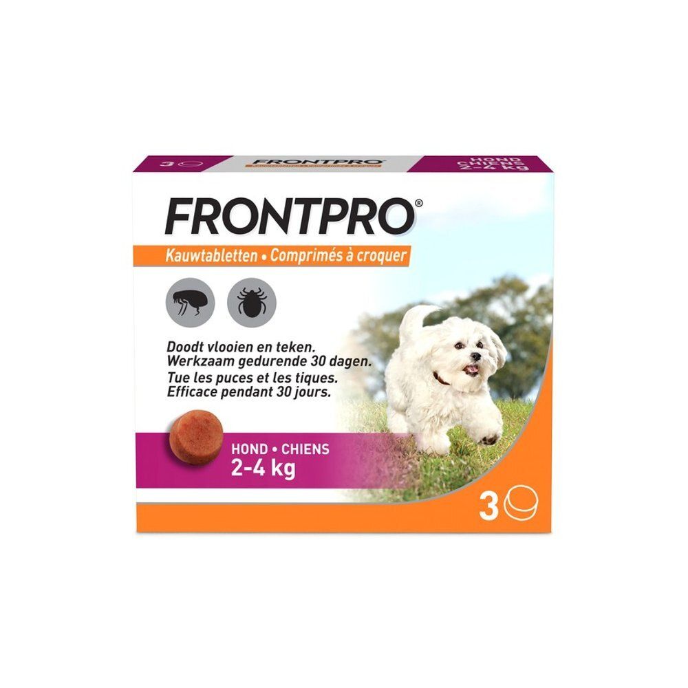 Een vrouw geeft een hond een FRONTPRO kauwtablet. Tekst: "Doodt vlooien en teken."