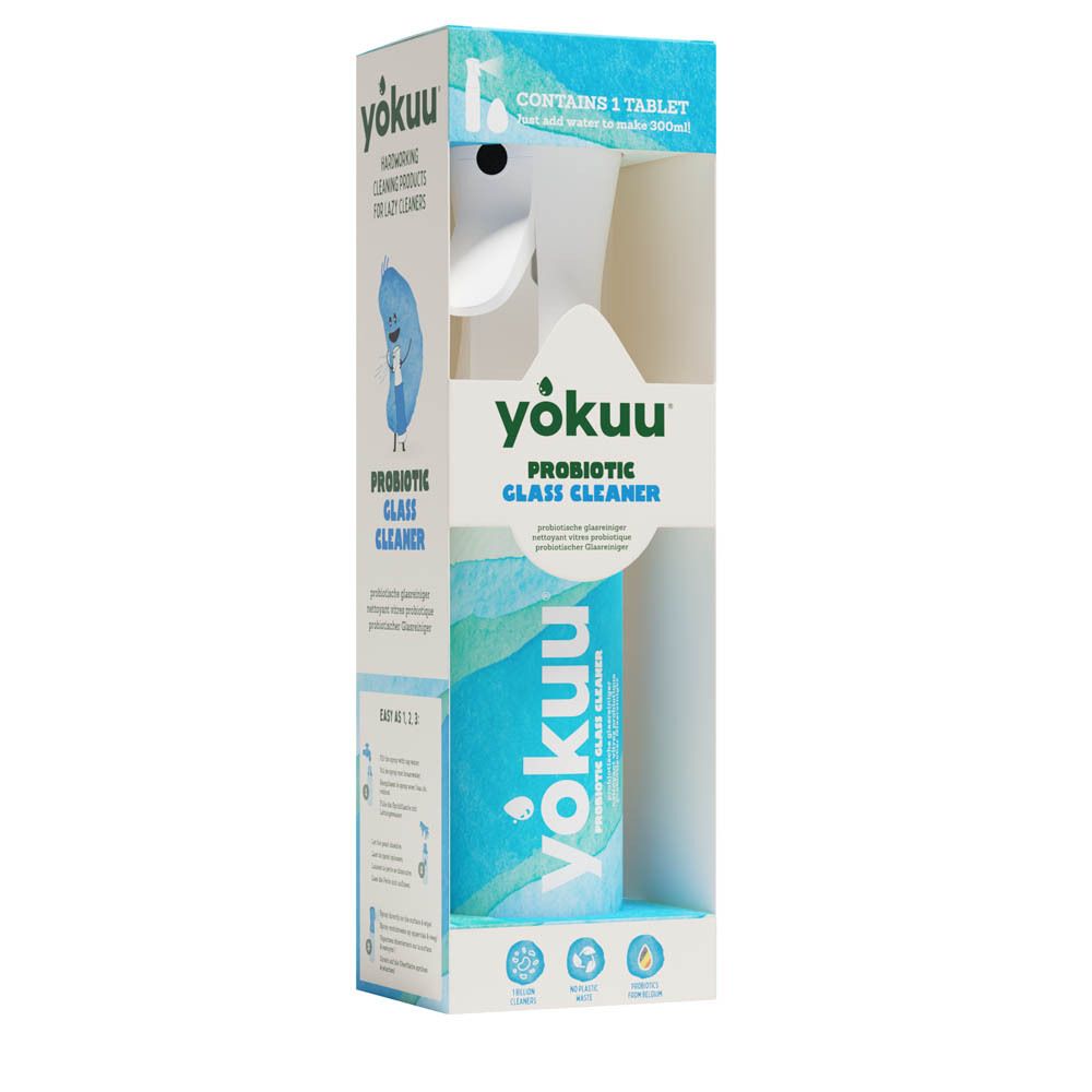 Verpakking met spuitfles. Merk: yokuu. Productnaam en logo. Blauwe en groene elementen. Starter Kit.