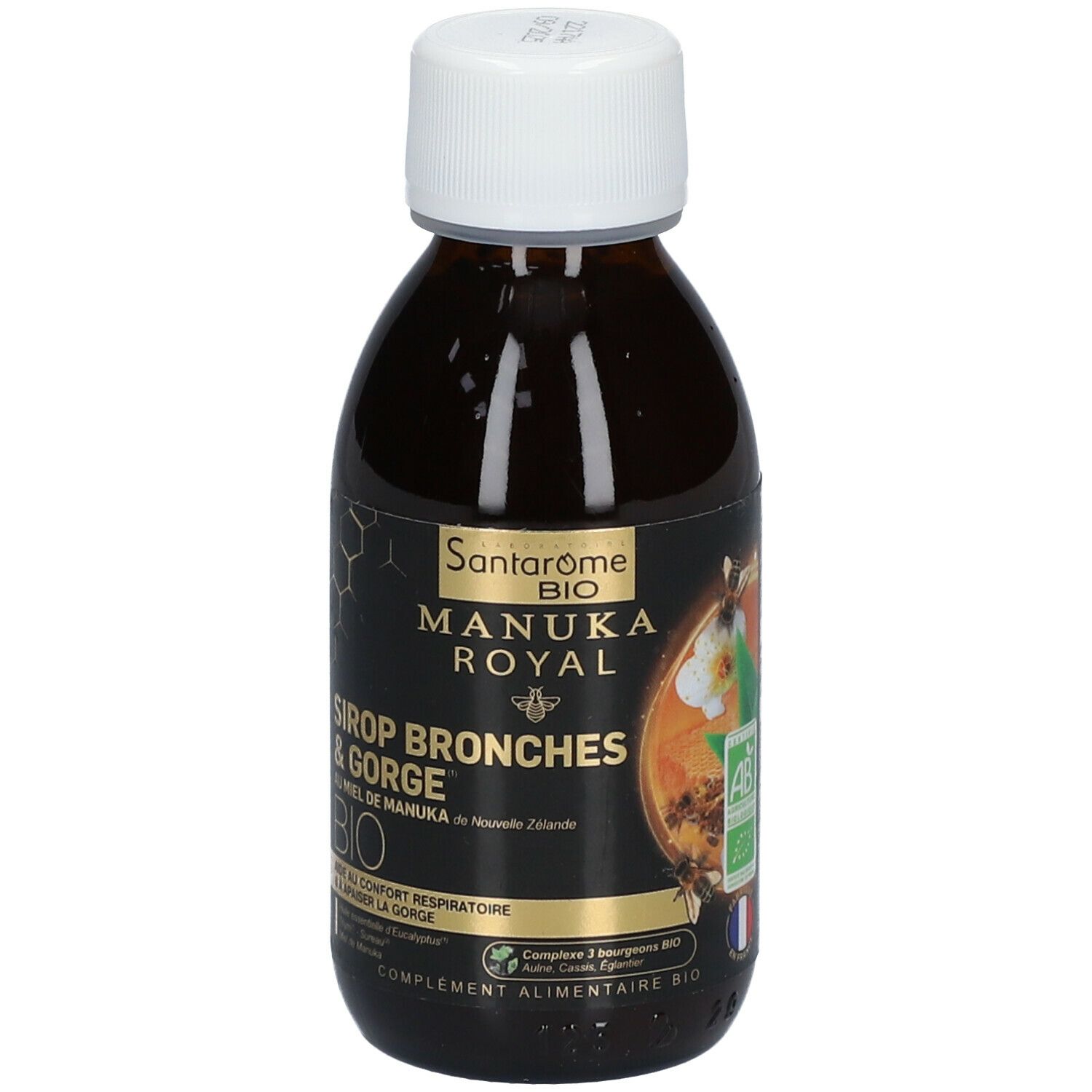 Bruine fles met witte dop. Etiket met productnaam, Manuka honing motief en bio-label. Franse tekst.