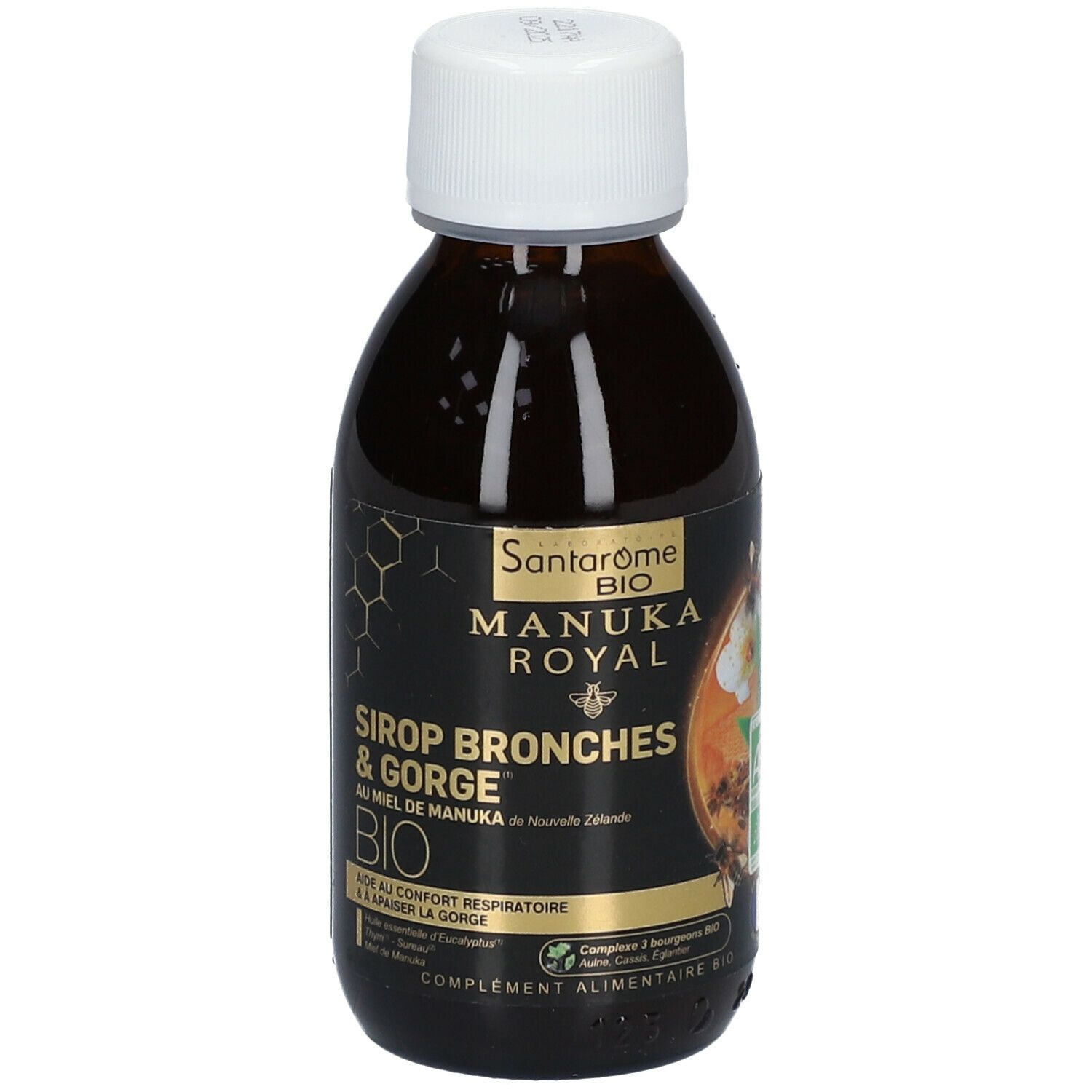 Bruine fles met witte dop. Etiket met productnaam, Manuka honing motief en bio-label. Franse tekst.