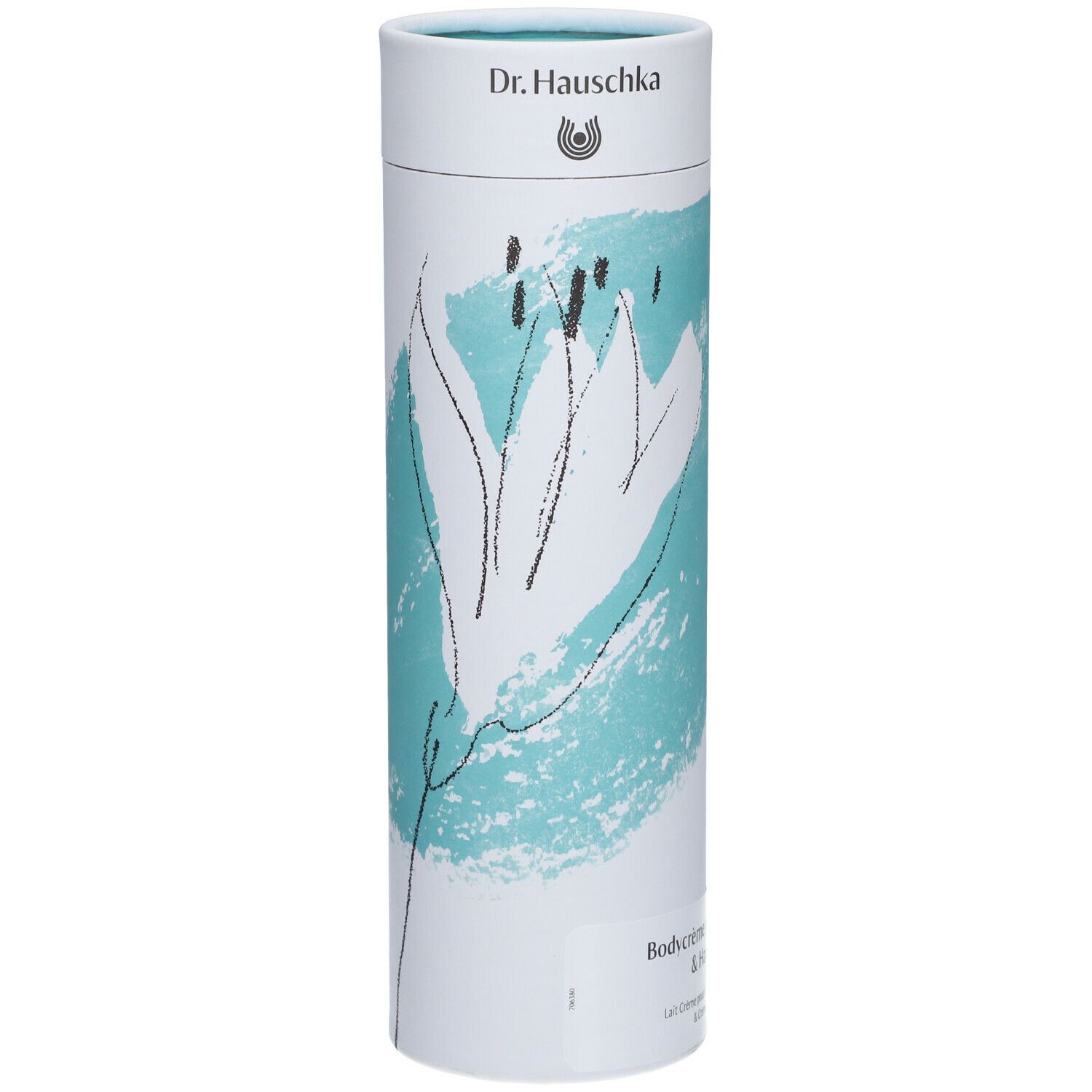 Emballage cylindrique avec motif floral et nom du produit. En haut : logo Dr. Hauschka. En bas : Bodycrème Amande & Crème de Mains.